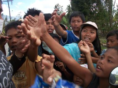 Child wearing baseball hat playing outdoors